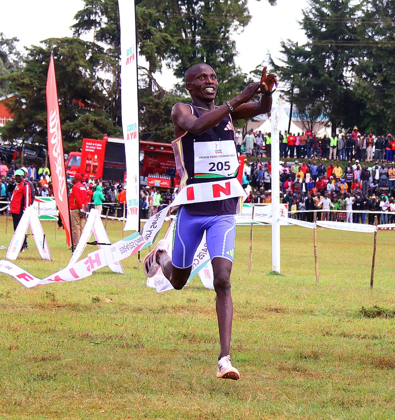 Robert Kiprop celebrating after successfully defending Iten Cross Country 10km elite race ..photo Peter Njoroge 